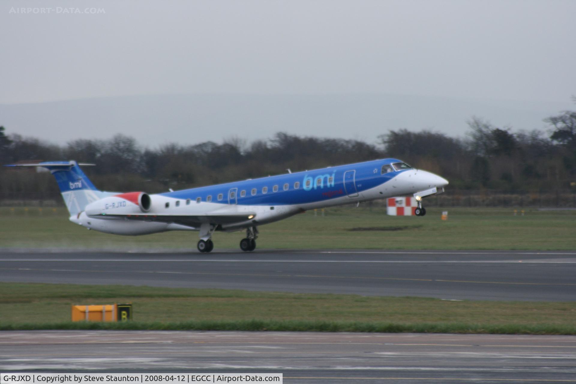 G-RJXD, 2000 Embraer EMB-145EP (ERJ-145EP) C/N 145207, Taken at Manchester Airport on a typical showery April day