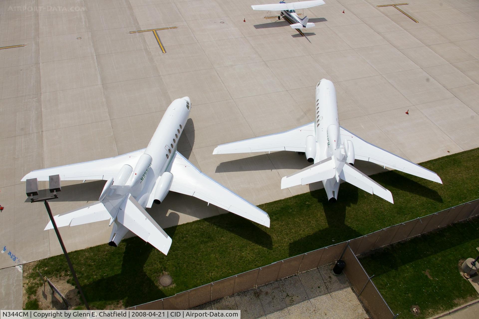 N344CM, 2000 Dassault Falcon 50 C/N 300, Below the control tower.  Plane on the left is N255CM