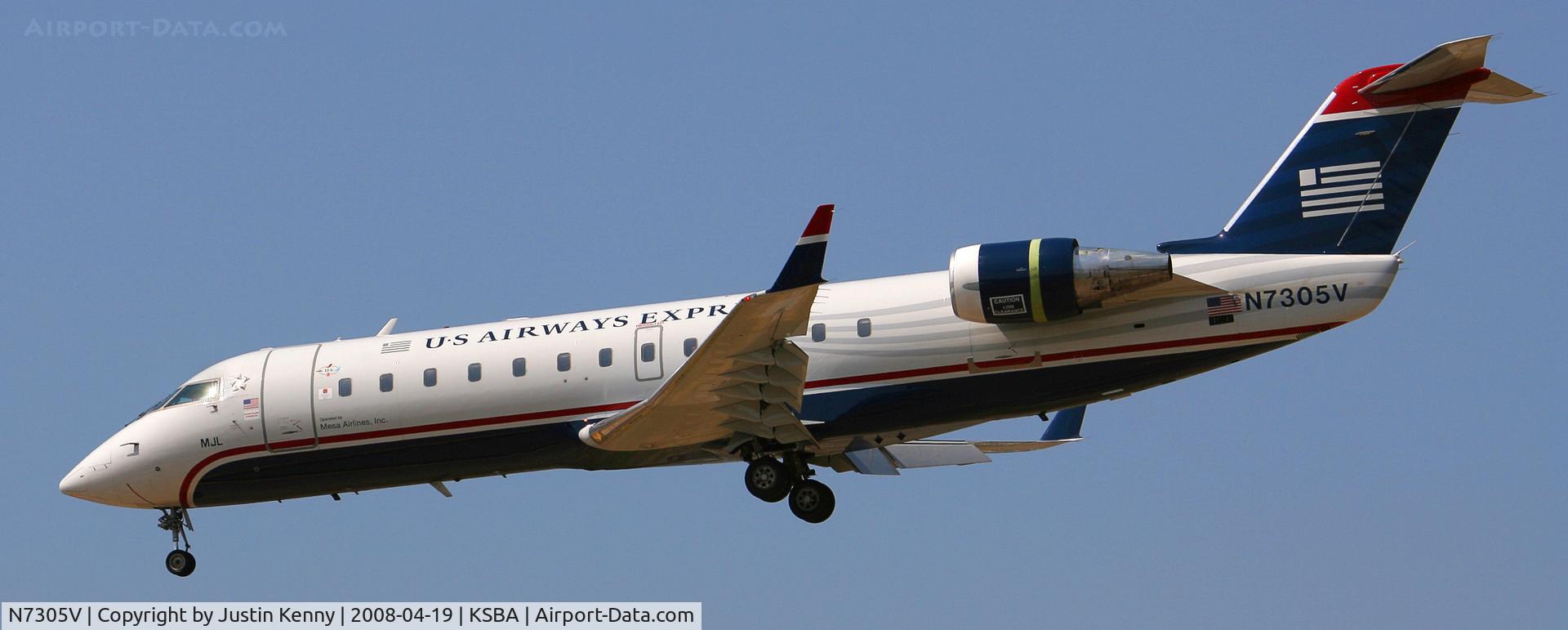 N7305V, 1999 Bombardier CRJ-200LR (CL-600-2B19) C/N 7305, N7305V Landing on runway 25 at KSBA