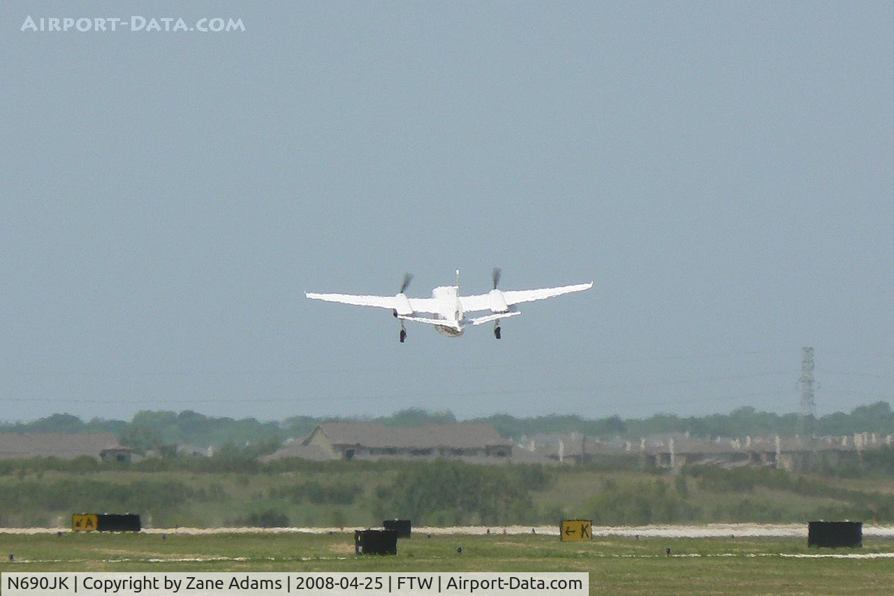 N690JK, 1978 Rockwell International 690B C/N 11480, Taking off on runway 27 Meacham Field