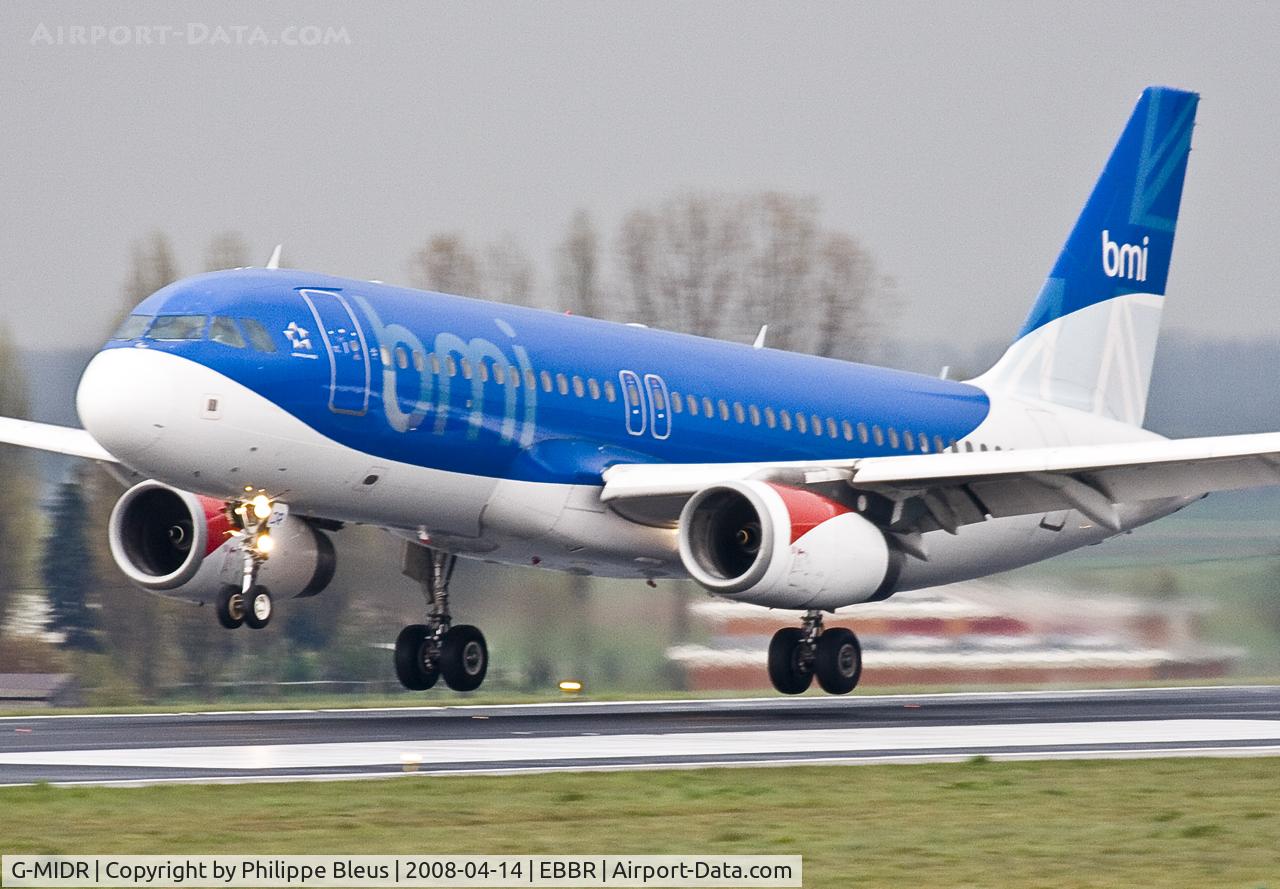 G-MIDR, 2002 Airbus A320-232 C/N 1697, Overflying rwy 25L, seconds before touchdown at sunset.