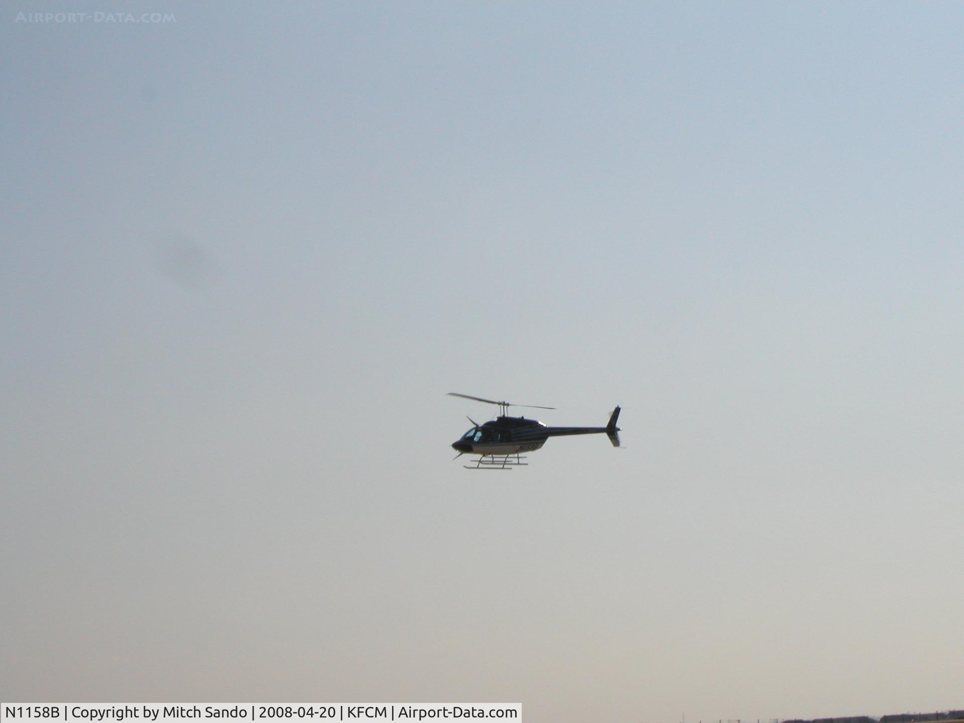 N1158B, 1996 Bell 206B JetRanger III C/N 4431, On approach to the Elliott Ramp.