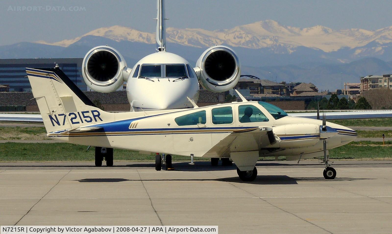 N7215R, 1976 Beech 95-B55 (T42A) Baron C/N TC-1944, Taxiing in front of a jet.