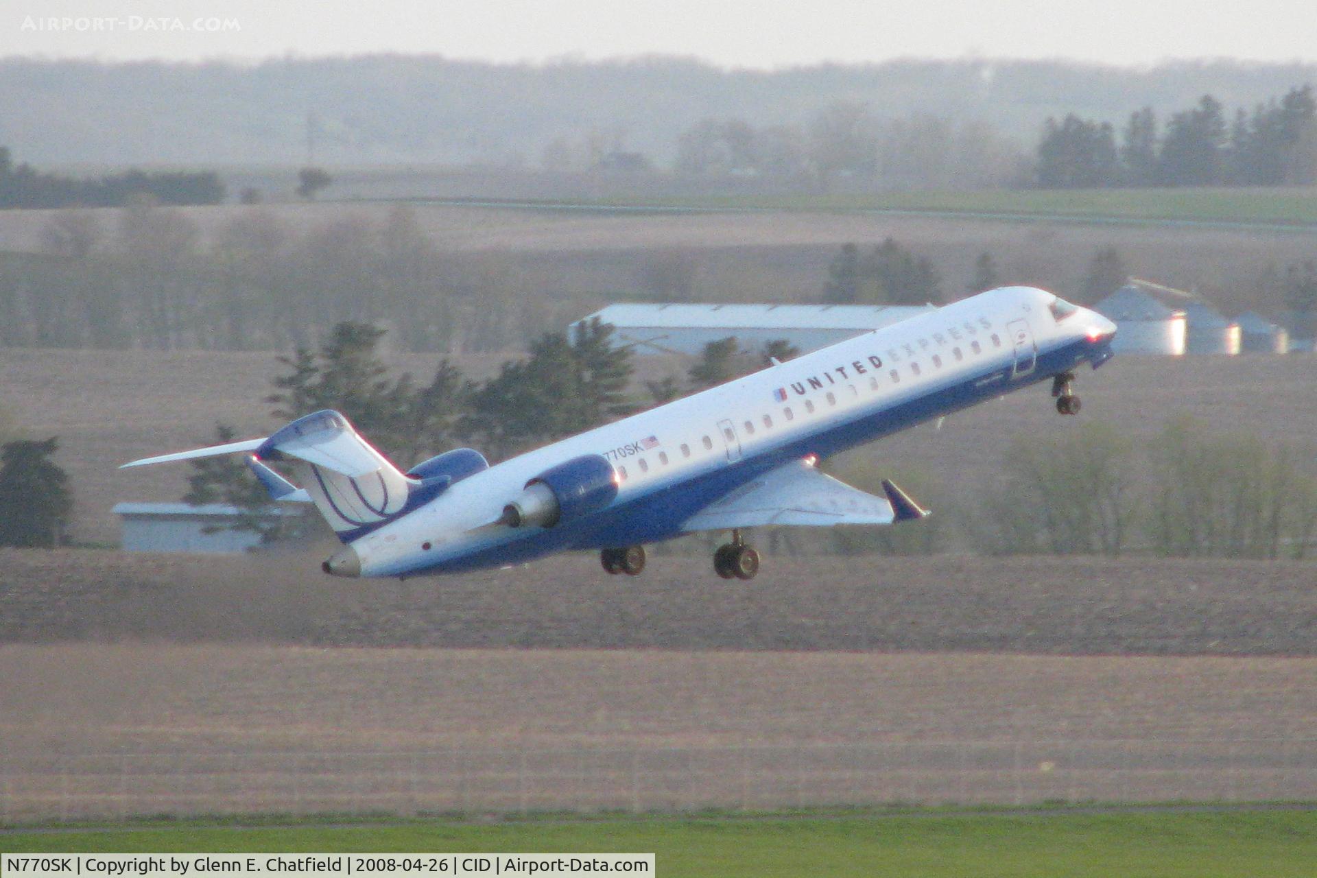 N770SK, 2006 Canadair CL-600-2C10 Regional Jet CRJ-700 C/N 10243, Departing Runway 27, late evening