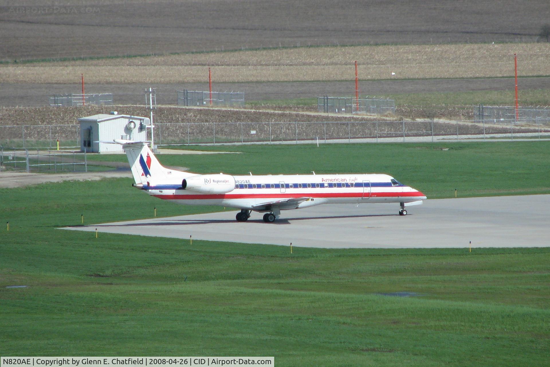 N820AE, 2002 Embraer ERJ-140LR (EMB-135KL) C/N 145576, Waiting in Runway 27 run-up pad for release to ORD