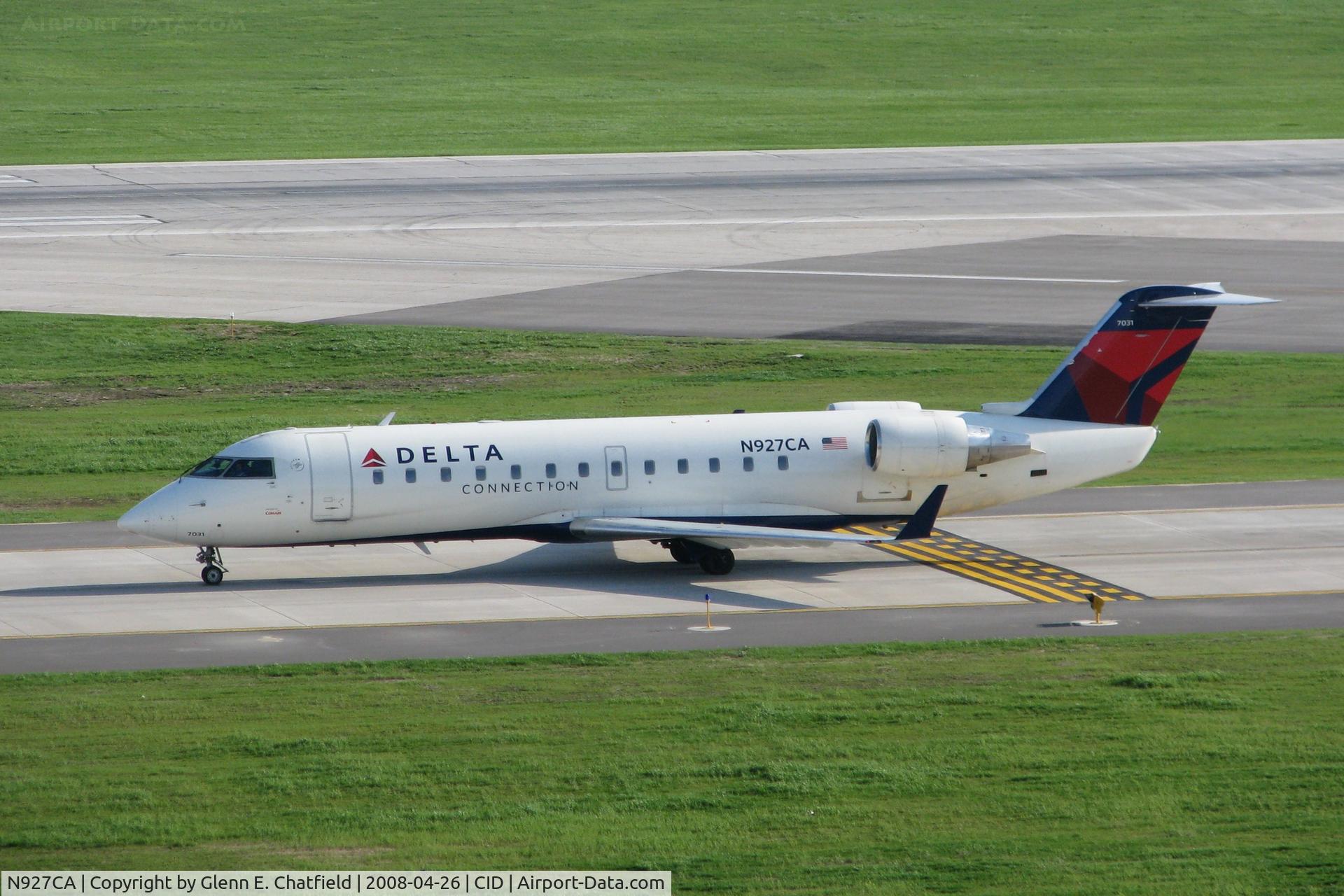 N927CA, 1993 Canadair CRJ-100ER (CL-600-2B19) C/N 7031, Taxiing across on Alpha to the gate