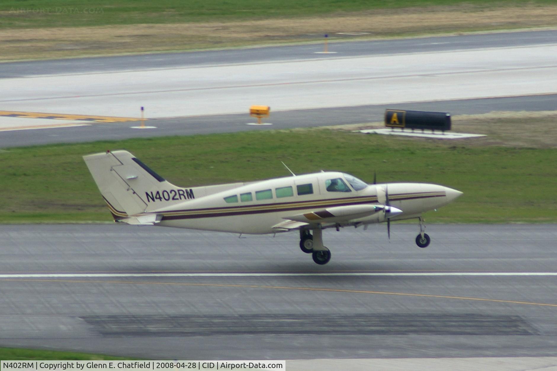 N402RM, 1974 Cessna 402B C/N 402B0607, Capital City 515 departing Runway 31 for STP