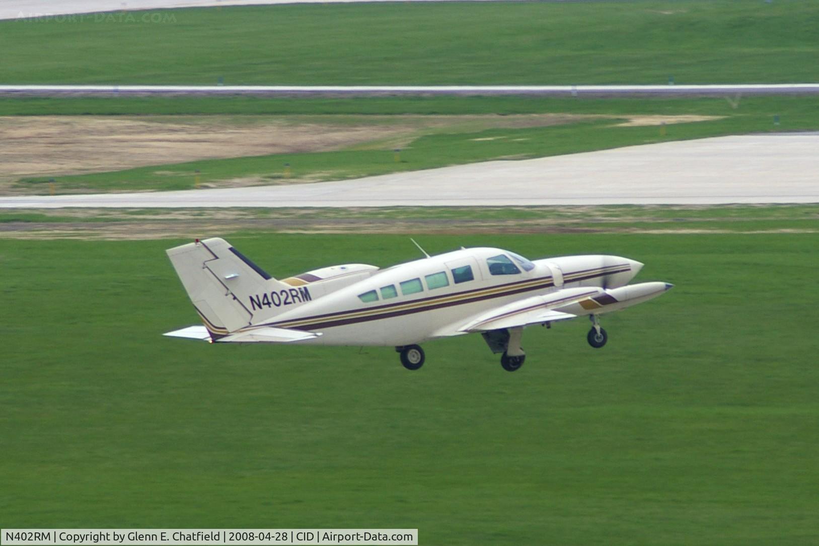 N402RM, 1974 Cessna 402B C/N 402B0607, Capital City 515 departing Runway 31 for STP