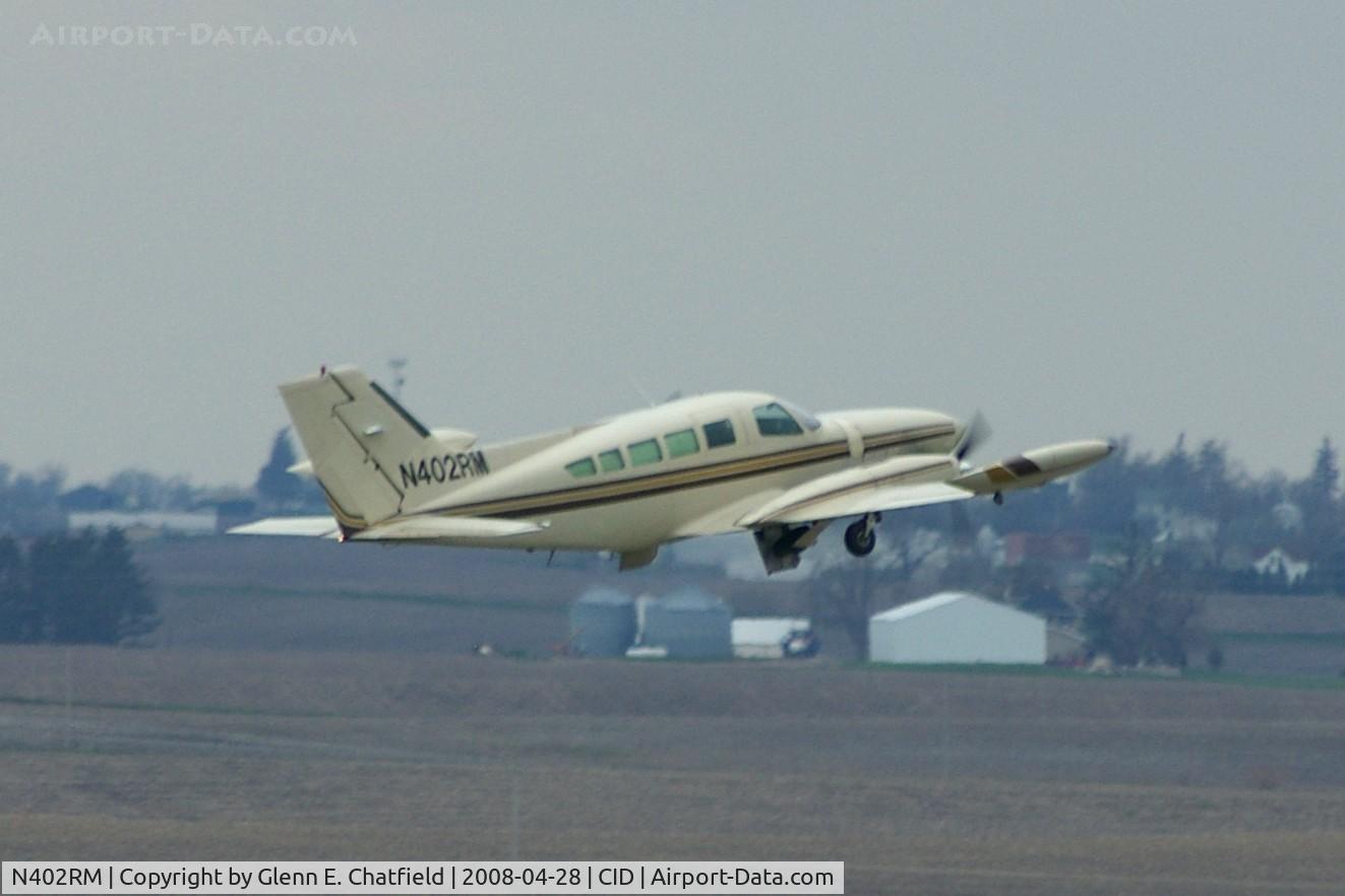 N402RM, 1974 Cessna 402B C/N 402B0607, Capital City 515 departing Runway 31 for STP
