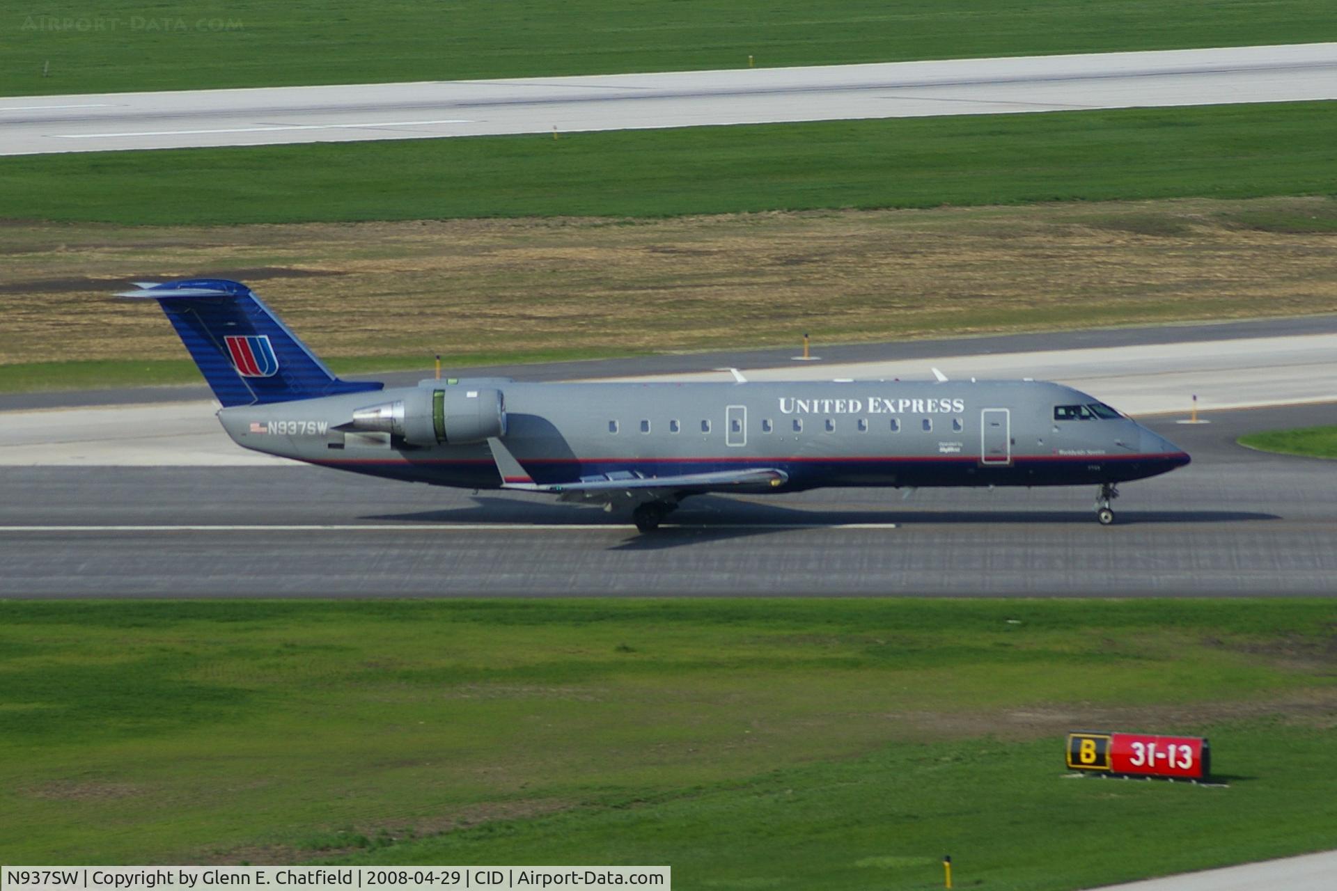 N937SW, 2003 Bombardier CRJ-200LR (CL-600-2B19) C/N 7735, Rolling out after landing runway 31