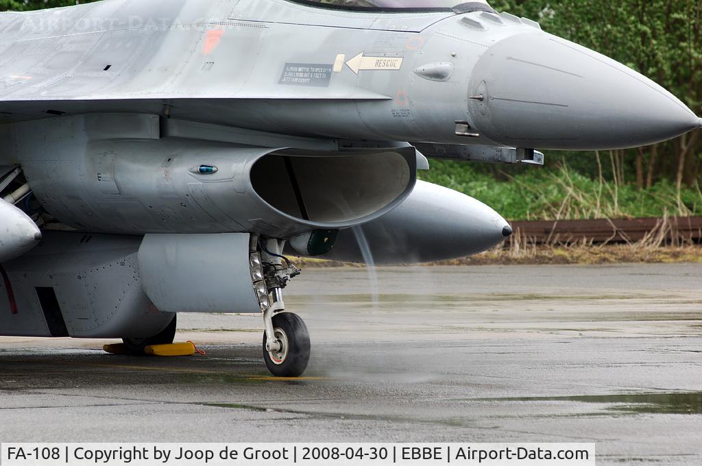 FA-108, SABCA F-16AM Fighting Falcon C/N 6H-108, Under wet circumstances the F-16 develops a small tornado in the intake sucking up the water from the taxiway.