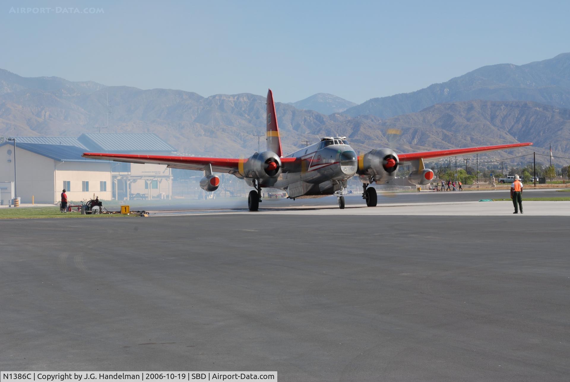 N1386C, 1954 Lockheed P2V-5 Neptune C/N 426-5268, P-2E tanker at SBD 44 firing up for a drop