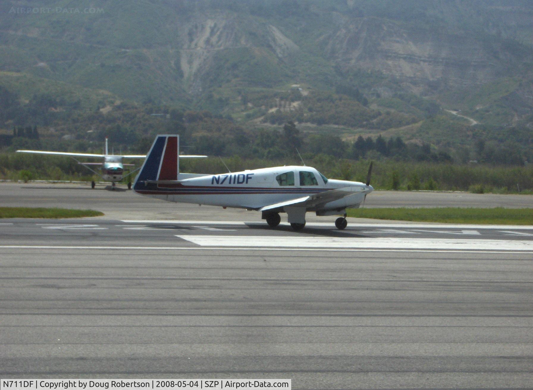 N711DF, 1963 Mooney M20C Ranger C/N 2532, 1963 Mooney M20C, Lycoming O&VO-360 180 Hp, landing roll Rwy 22