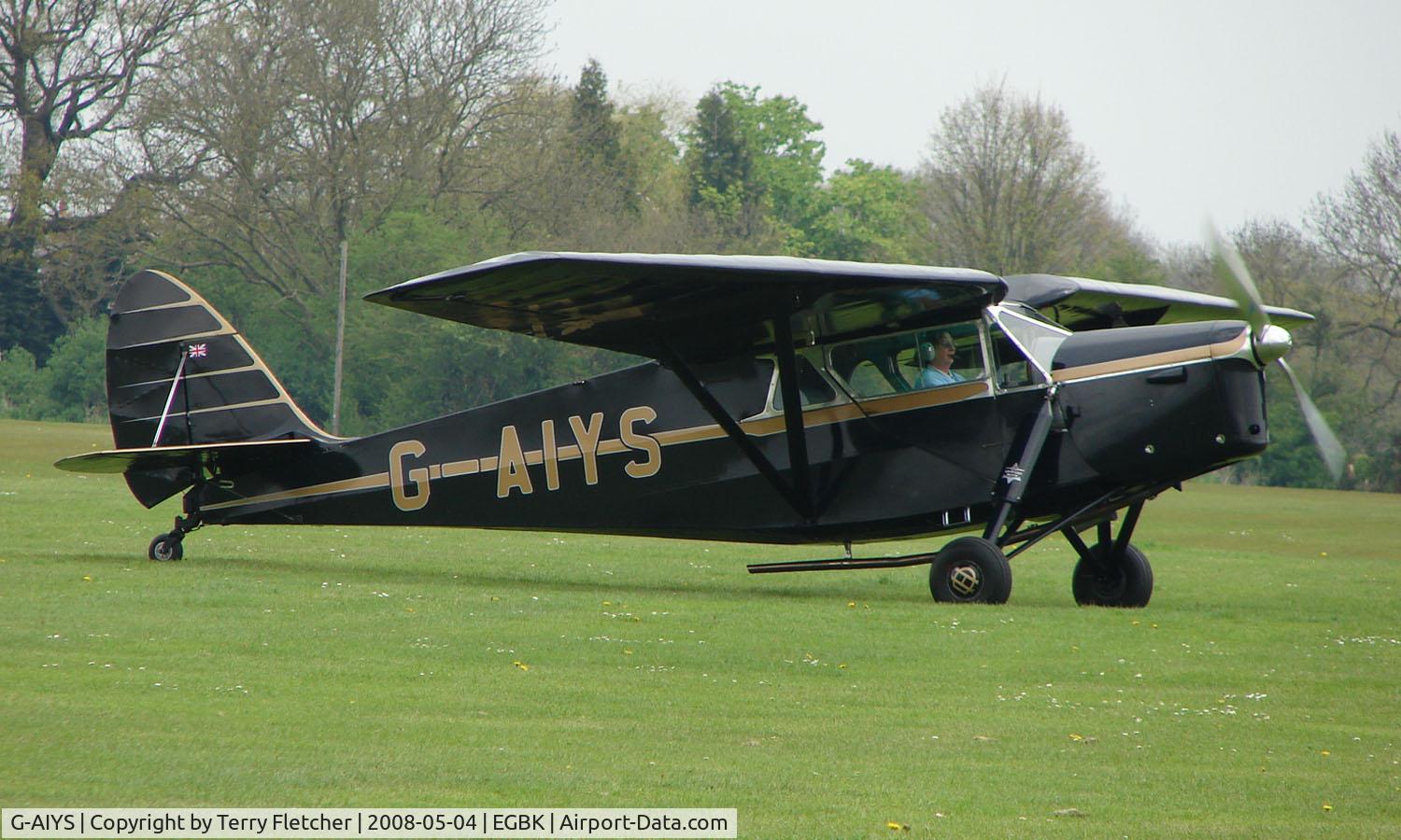 G-AIYS, 1934 De Havilland DH.85 Leopard Moth C/N 7089, Lady pilot carefully looking after this classic Leopard Moth