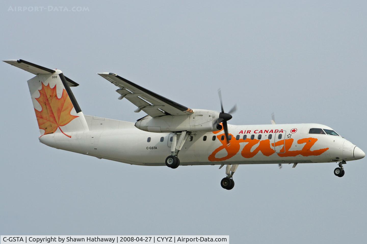 C-GSTA, 1989 De Havilland Canada DHC-8-301 Dash 8 C/N 182, Landing Runway 32 (Canon XT, 70-300mm)