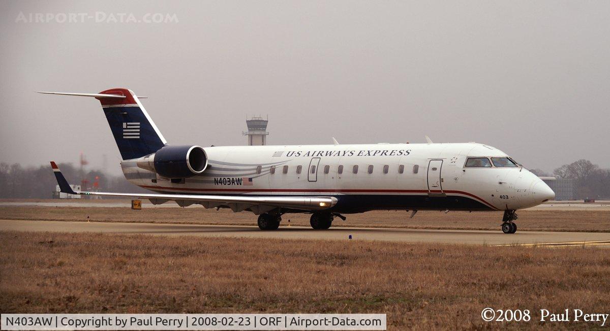 N403AW, 1999 Bombardier CRJ-200LR (CL-600-2B19) C/N 7288, Rolling out, with a load of passengers