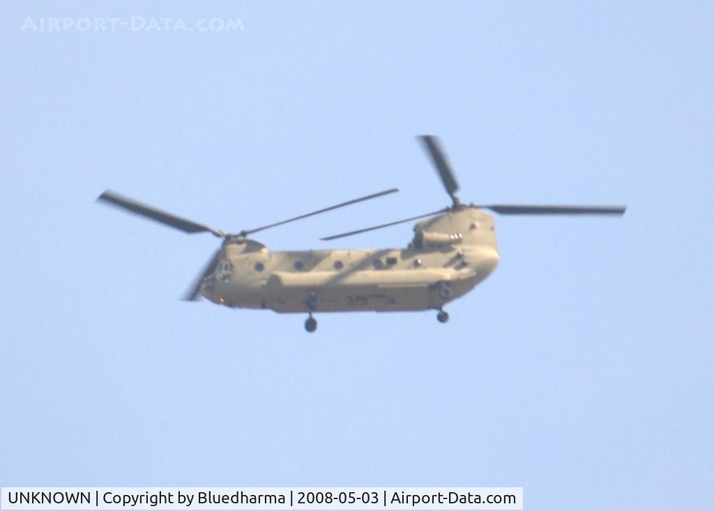 UNKNOWN, Helicopters Various C/N unknown, Boeing CH-47 Chinook over downtown Littleton, CO heading NE.