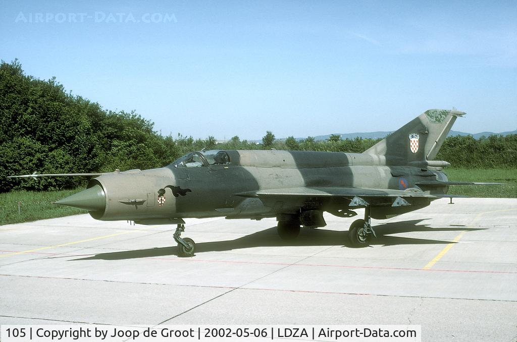 105, Mikoyan-Gurevich MiG-21bis C/N Not found 105, Not often seen: the Croatian MiG-21. The serial number is hand written in the main wheel bay.