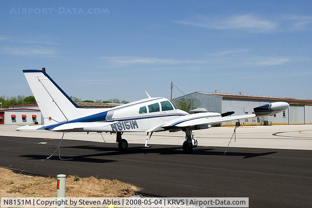 N8151M, 1964 Cessna 310I C/N 310I0151, White, blue, and silver Cessna 310 tied down at KRVS.