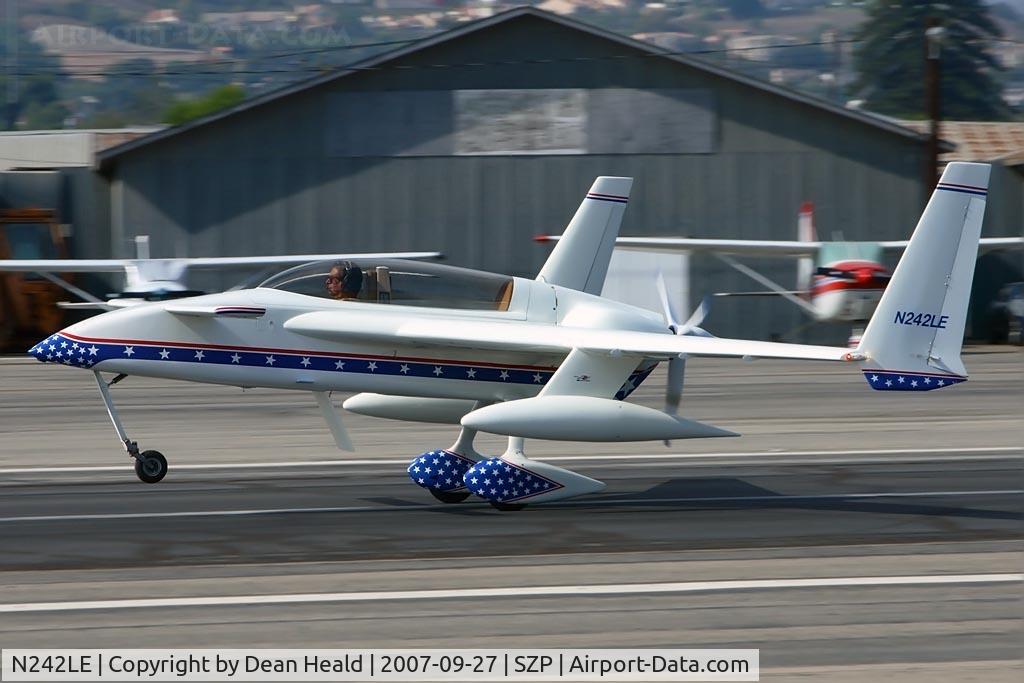 N242LE, 1990 Rutan Long-EZ C/N 1 (N242LE), 1990 Merrill Eidson homebuilt LongEZ N242LE landing on RWY 22. What a great looking plane equipped with long-range fuel tanks.