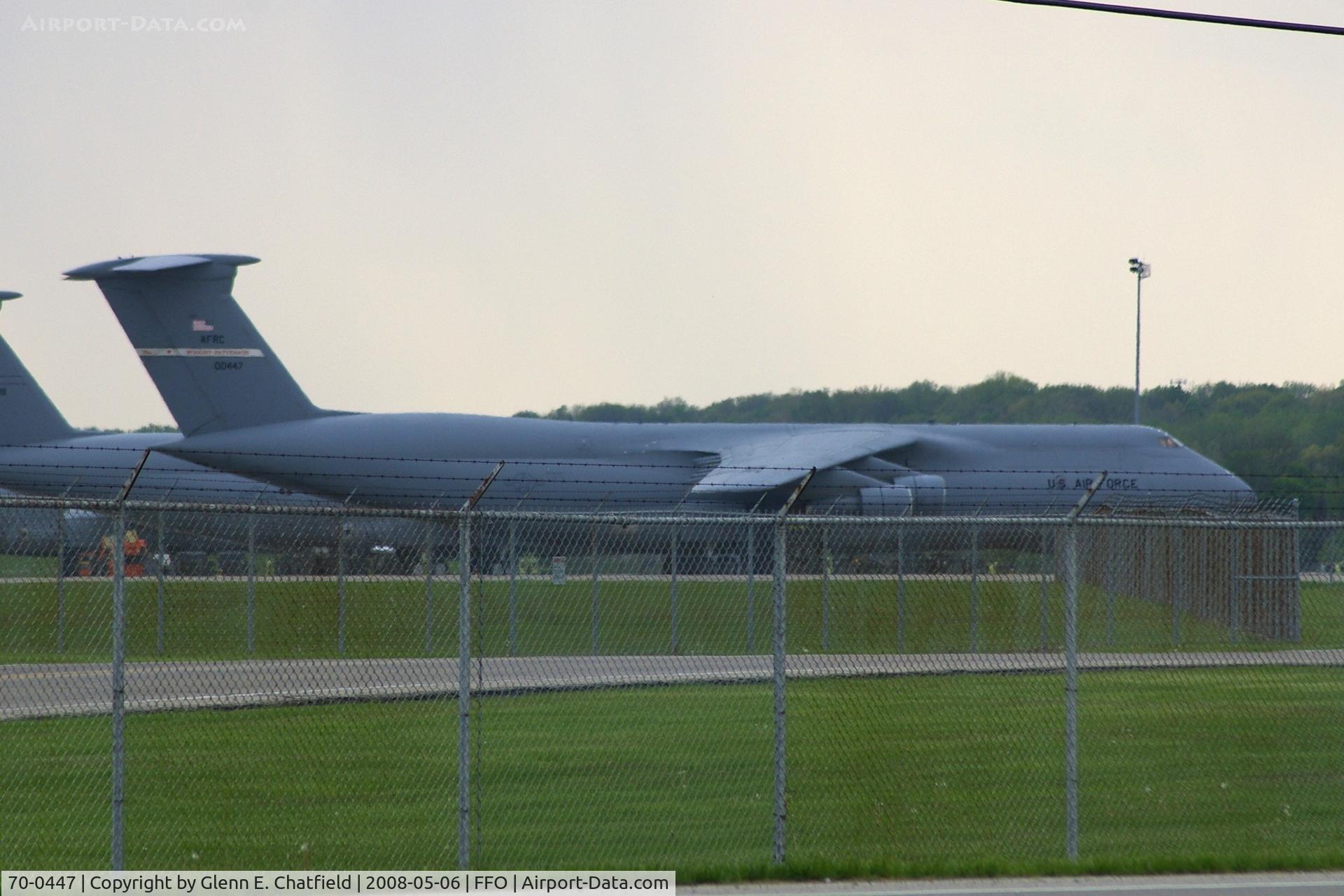 70-0447, 1970 Lockheed C-5A Galaxy C/N 500-0061, C-5A parked on the ramp, as seen from the road through the fence