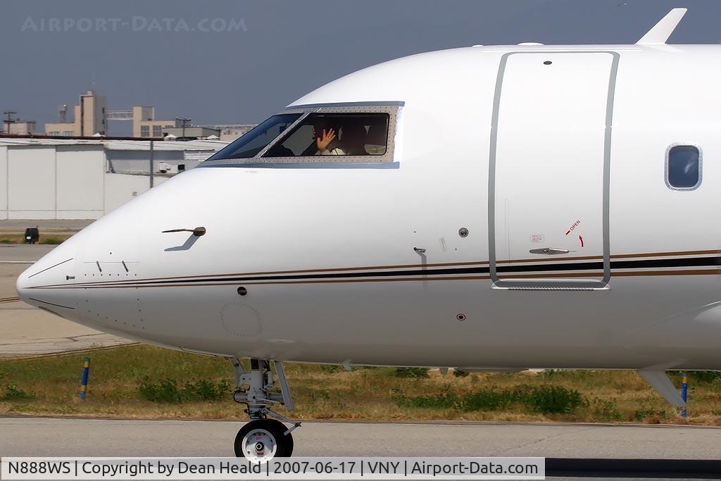 N888WS, 1994 Canadair Challenger 601-3R (CL-600-2B16) C/N 5170, Close-up of Williams Sonoma 1994 Canadair Challenger CL-600-2B16 N888WS taxiing to RWY 16R for departure, with a friendly pilot waving hello, acknowleging my presence.
