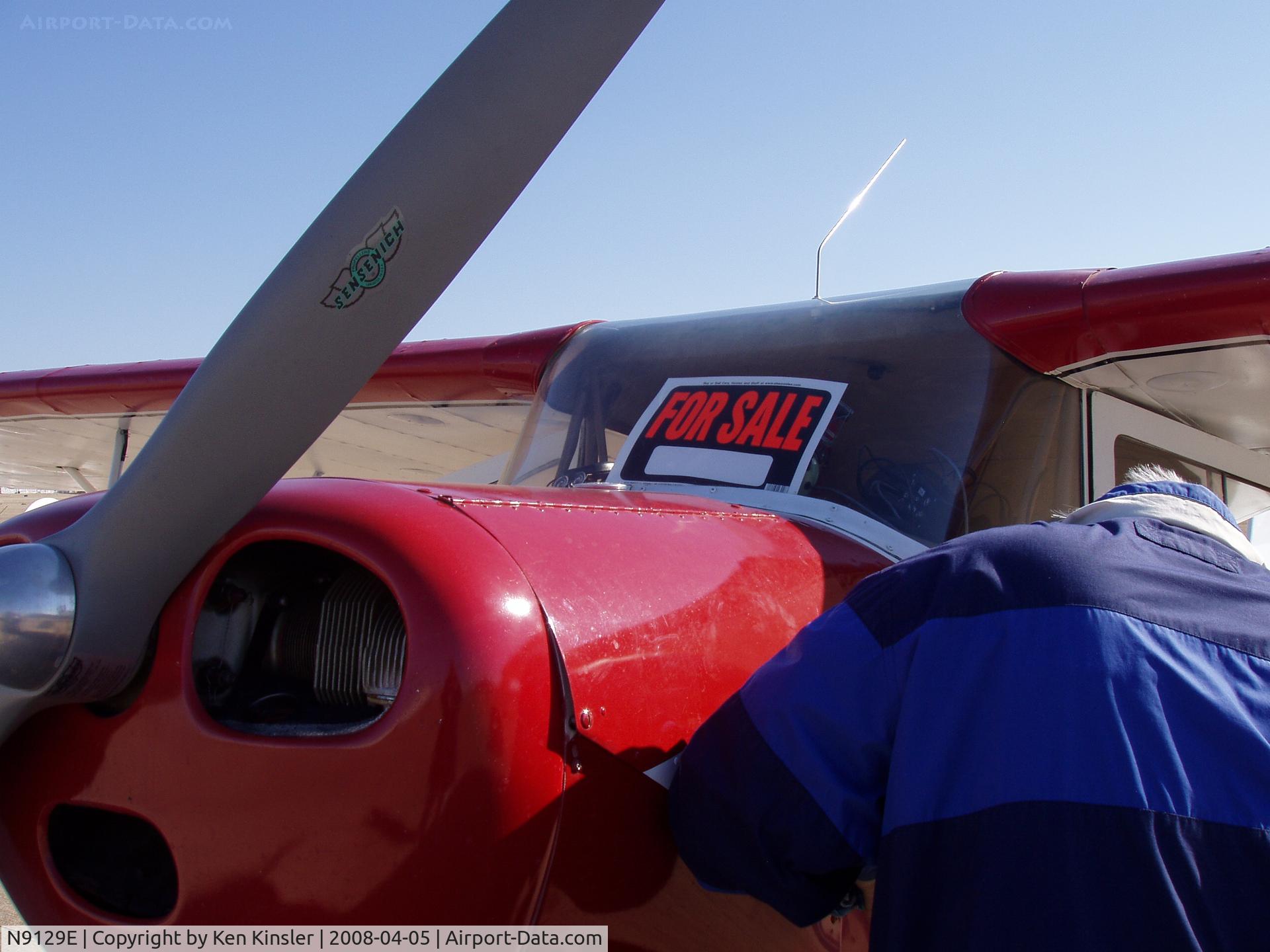 N9129E, 1946 Aeronca 11AC Chief C/N 11AC-762, Ken checking oil at fly in @ Ponca city Ok.