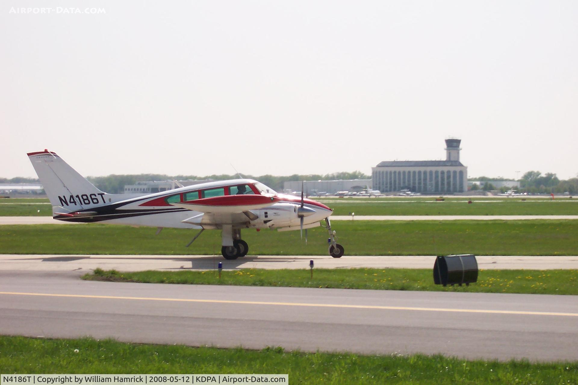 N4186T, 1966 Cessna 320D Executive Skyknight C/N 320D0086, Taxing at DuPage