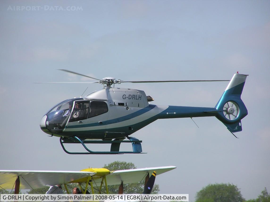 G-DRLH, 2007 Eurocopter EC-120B Colibri C/N 1477, EC120 landing at Sywell, note Tiger Moth G-ALIW in foreground