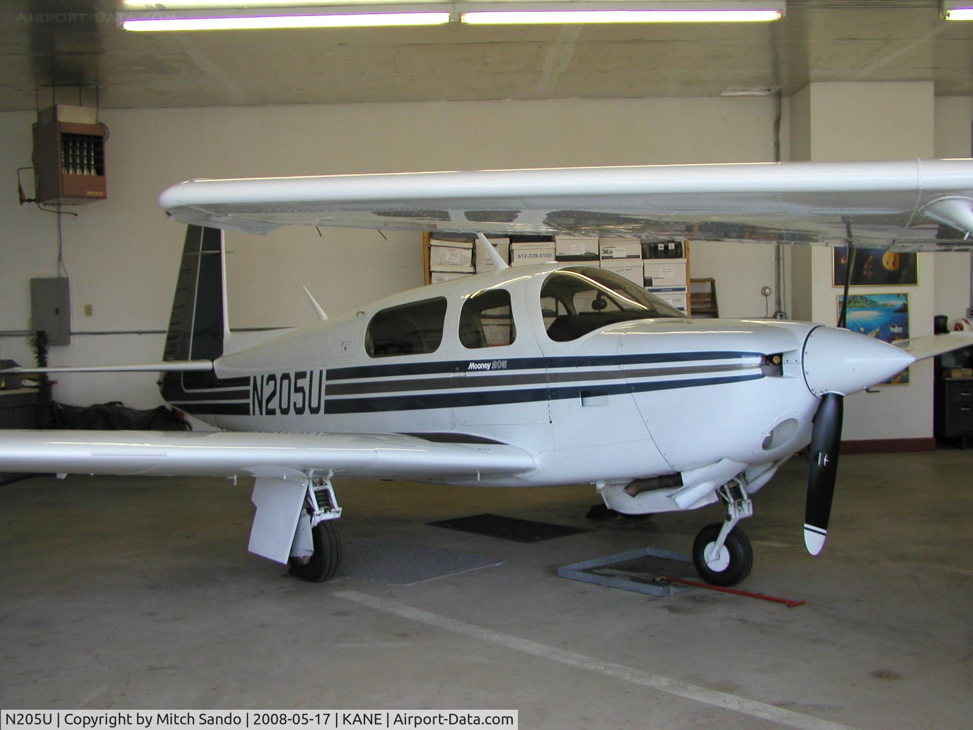 N205U, Mooney M20J 201 C/N 24-3036, Parked inside the hangar.