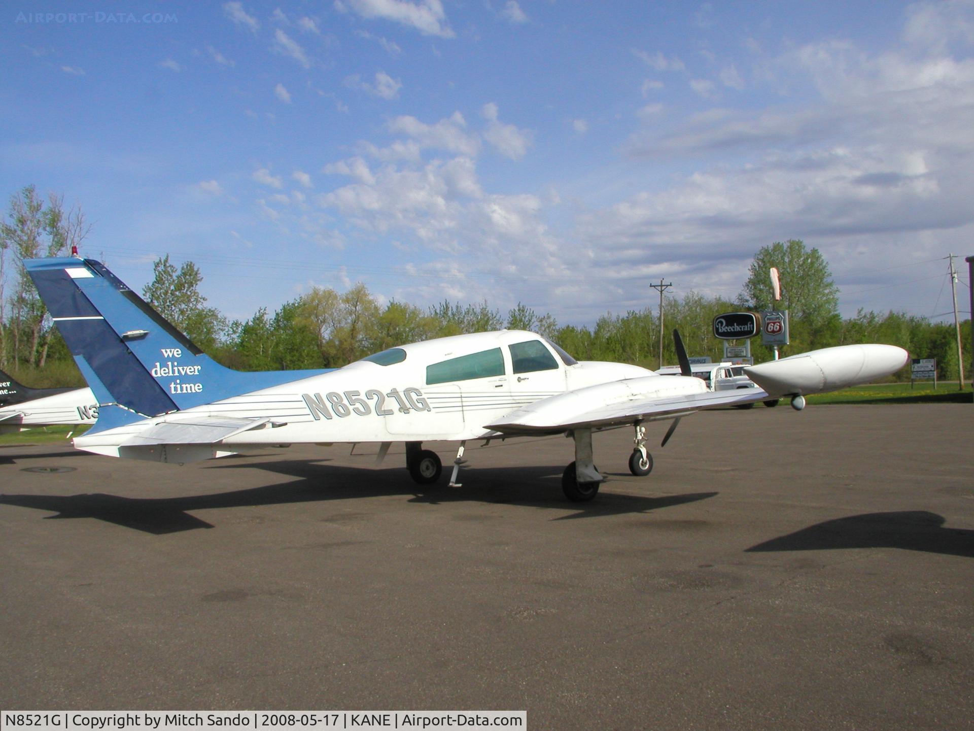 N8521G, Cessna 310R C/N 310R0931, Parked on the ramp at Cirrus Flight Operations.