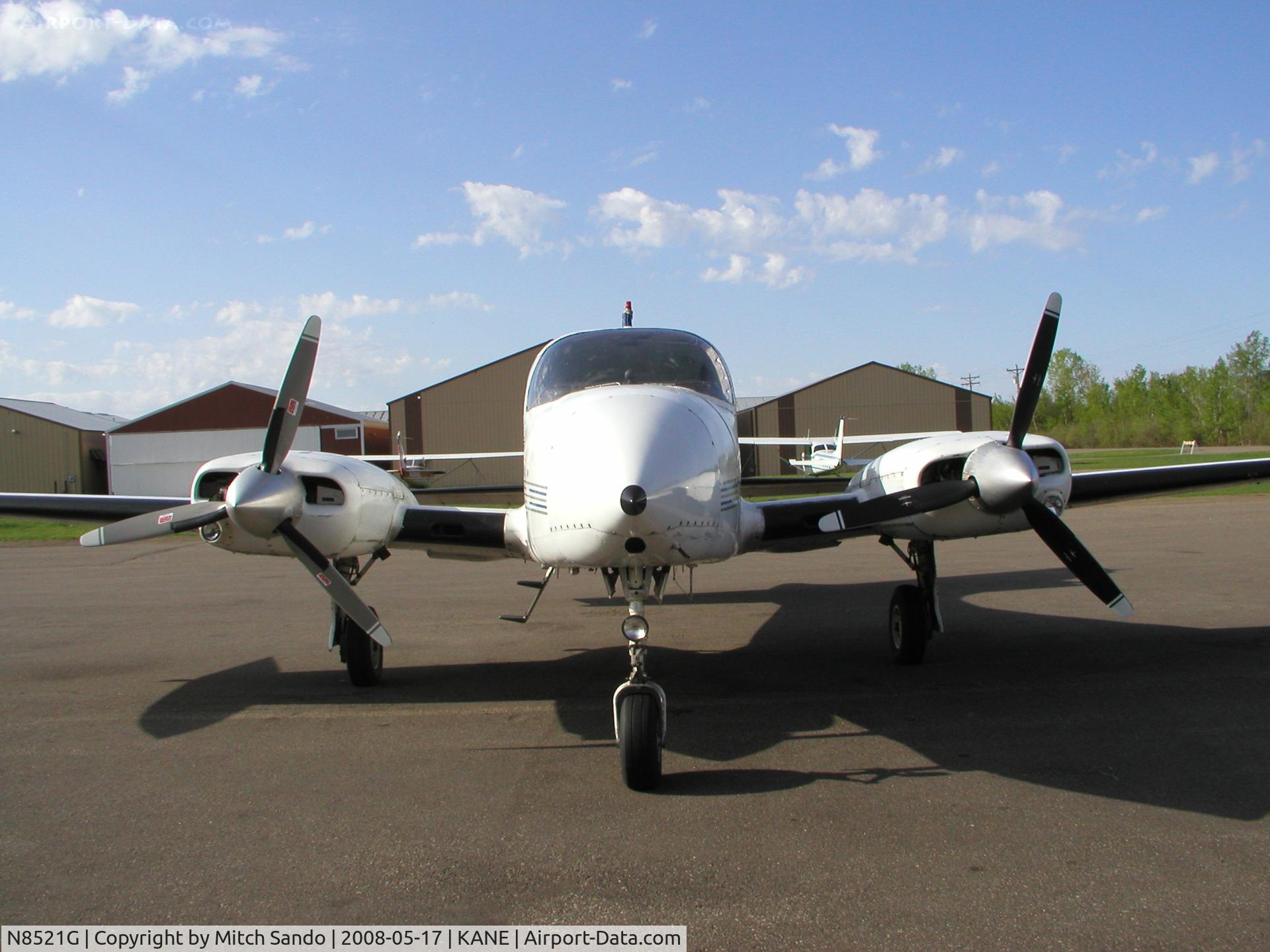 N8521G, Cessna 310R C/N 310R0931, Parked on the ramp at Cirrus Flight Operations.