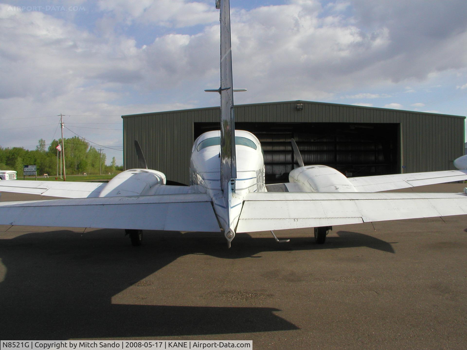 N8521G, Cessna 310R C/N 310R0931, Parked on the ramp at Cirrus Flight Operations.