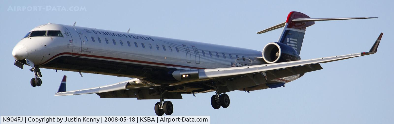N904FJ, 2003 Bombardier CRJ-900ER (CL-600-2D24) C/N 15004, N904FJ Landing on runway 25 at KSBA