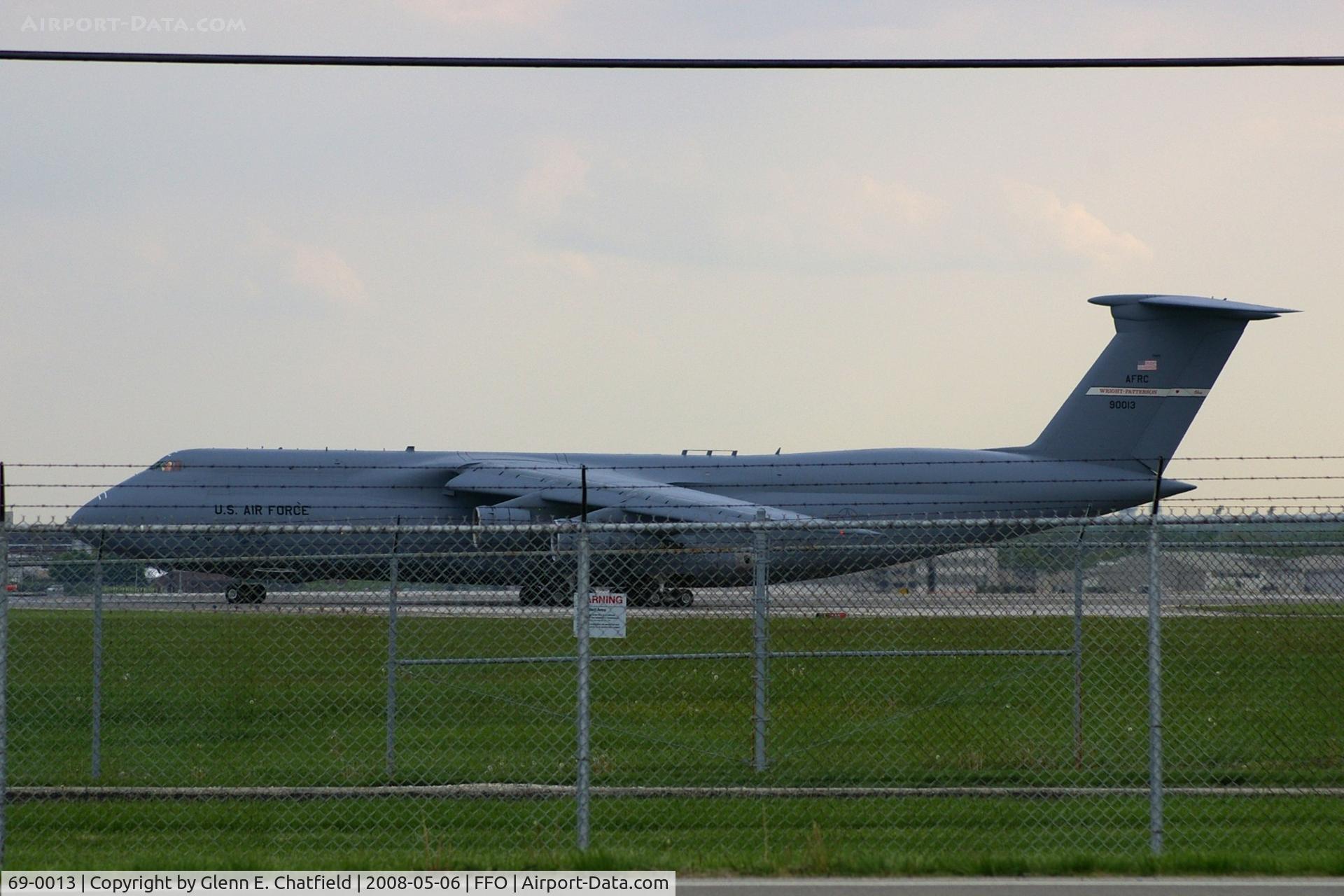 69-0013, 1969 Lockheed C-5A Galaxy C/N 500-0044, At the hold short line for departure.  Seen from across the street.