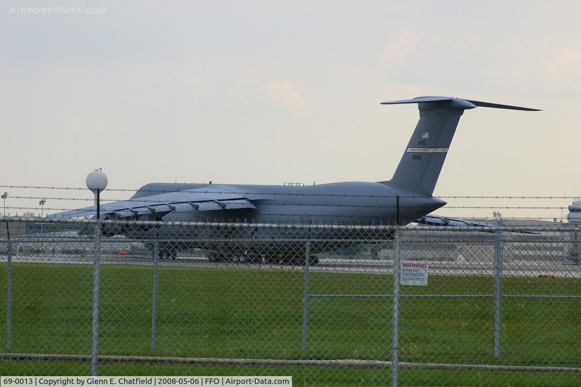 69-0013, 1969 Lockheed C-5A Galaxy C/N 500-0044, Taking the runway for departure.  Seen from across the street.