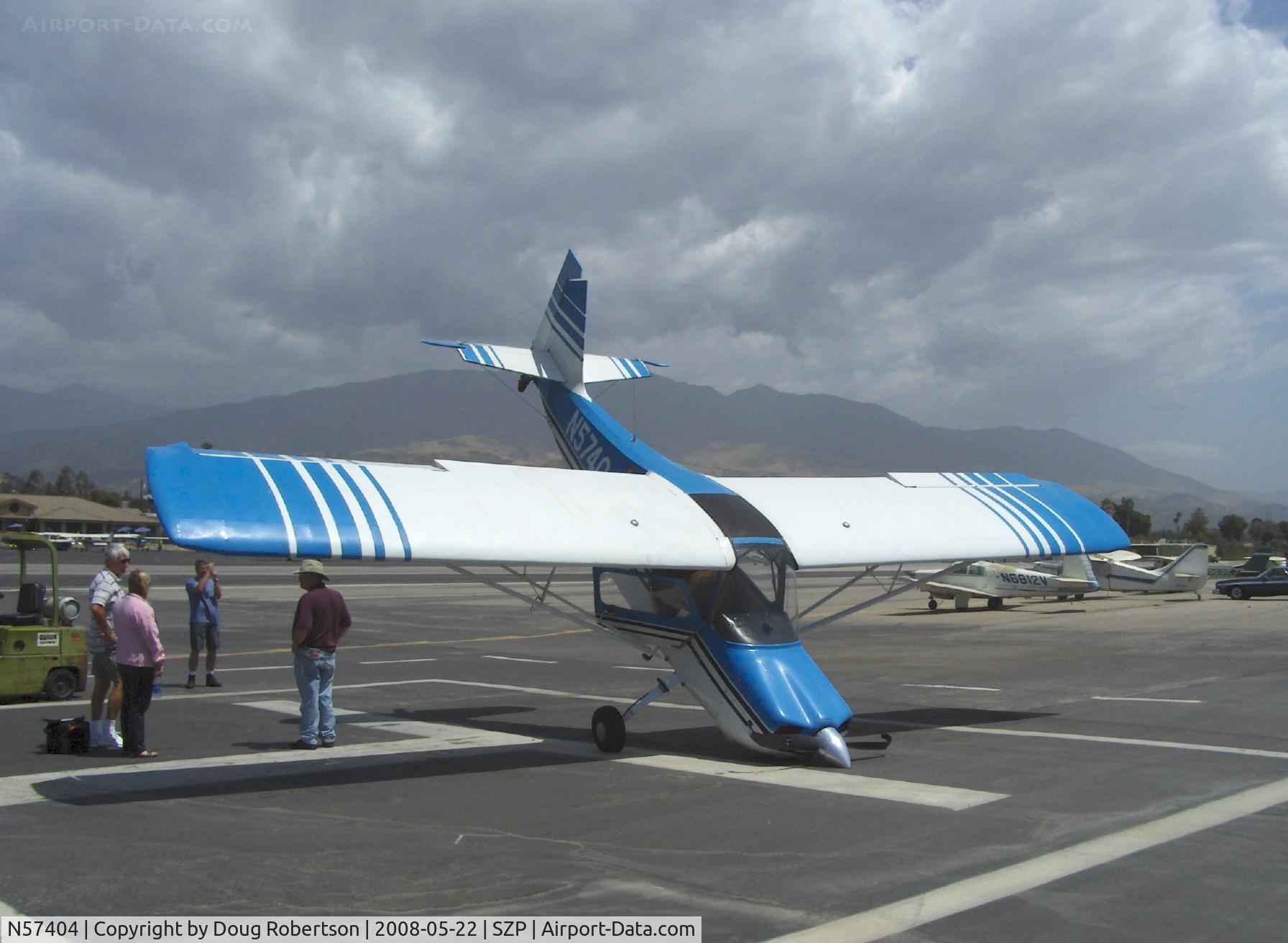 N57404, 1973 Bellanca 7ECA Citabria C/N 940-73, 1973 Bellanca 7ECA CITABRIA, Lycoming O-235 115 Hp, strong gusting left crosswind weathervaned aircraft off Rwy 22 on landing roll. Solo pilot stopped aircraft on SZP's helipad about 30 feet short of going over bank into Santa Clara River.
