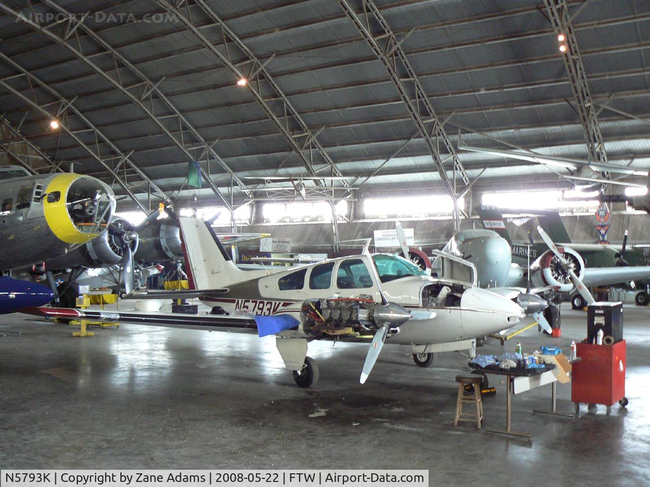 N5793K, 1964 Beech 95-B55 (T42A) Baron C/N TC-749, At Meacham Field - in the Vintage Flying Museum hanger
