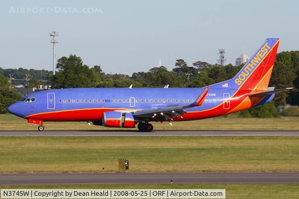 N374SW, 1993 Boeing 737-3H4 C/N 26582, Southwest Airlines N374SW (FLT SWA1746), 733 now with winglets, rolling out on RWY 5 after arrival from Baltimore/Washington Int'l (KBWI).