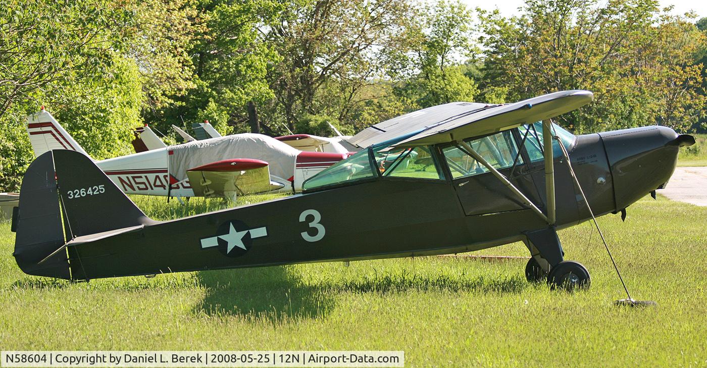 N58604, 1943 Taylorcraft DCO-65 C/N 5737, What a pleasant surprise to find this little gem tucked away in a corner!