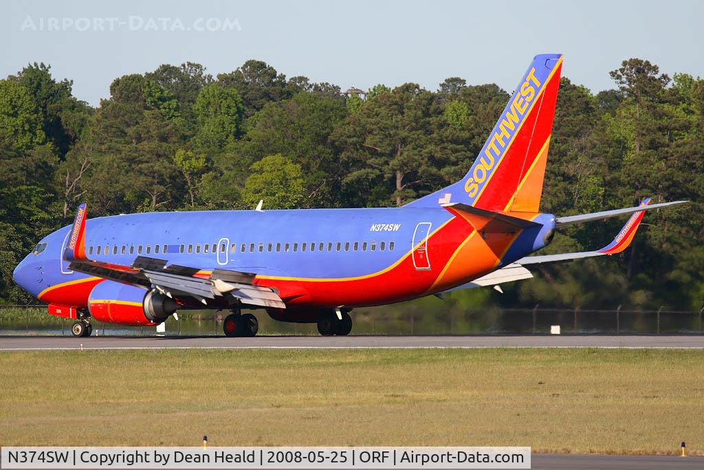 N374SW, 1993 Boeing 737-3H4 C/N 26582, Southwest Airlines N374SW (FLT SWA1746), 733 now with winglets, rolling out long on RWY 5 after arrival from Baltimore/Washington Int'l (KBWI).