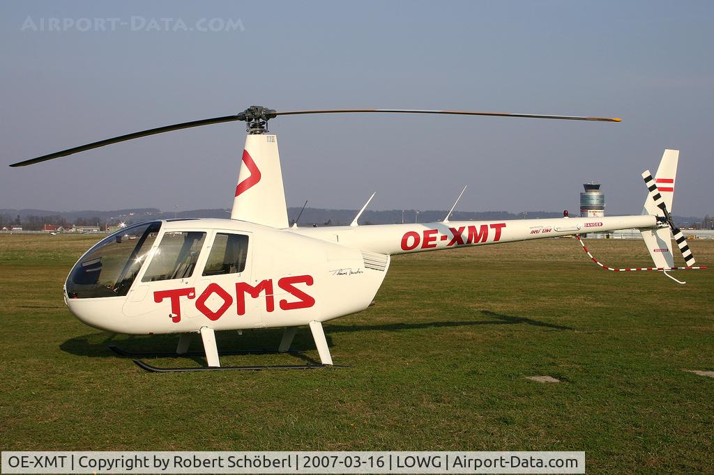 OE-XMT, 2007 Robinson R44 Raven II C/N 11624, Advertise for TOM´S. Operated by Heli Line