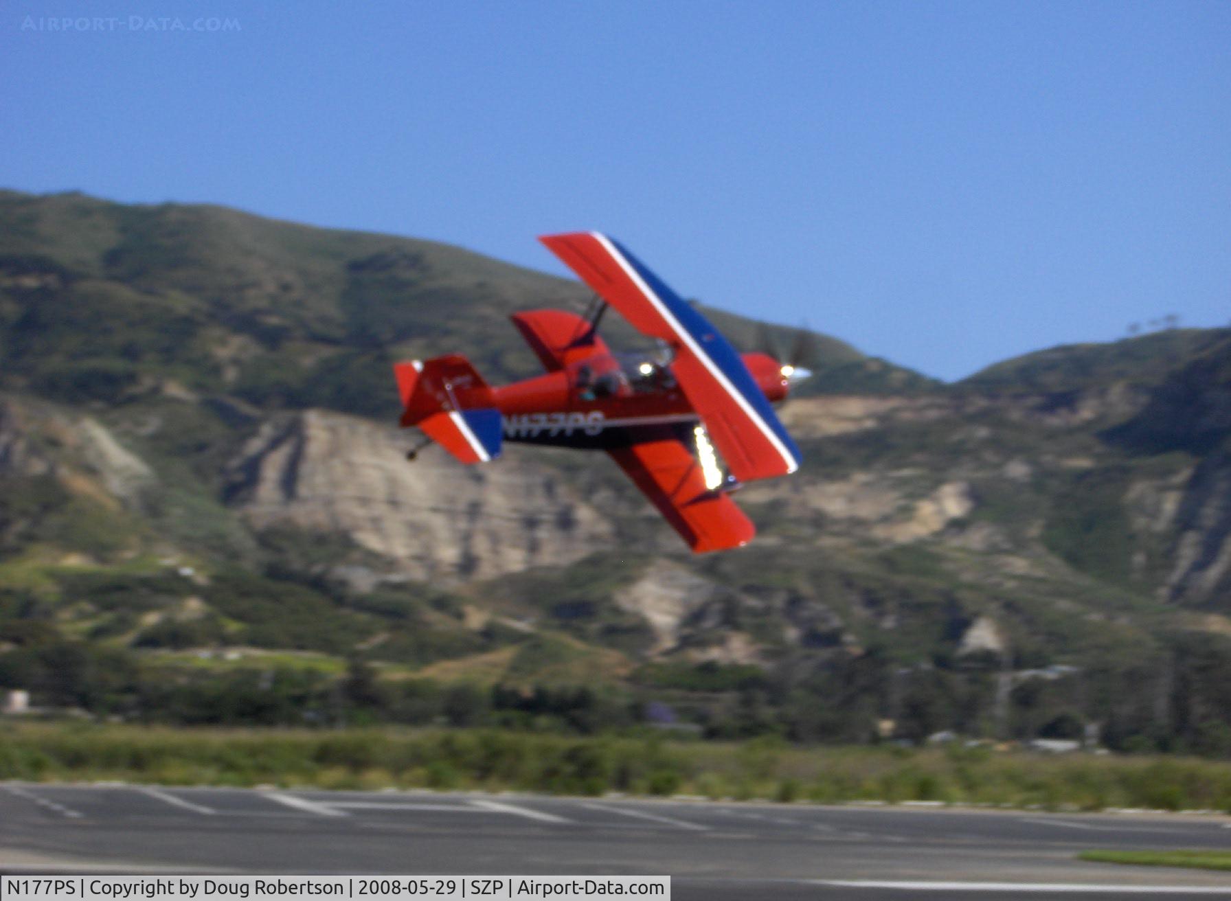 N177PS, 2000 Aviat Pitts S-2C Special C/N 6038, 2000 Aviat PITTS S-2C, Lycoming AEIO-540, takeoff climb Rwy 22 and bank for the photographer. Thanks, Jim!