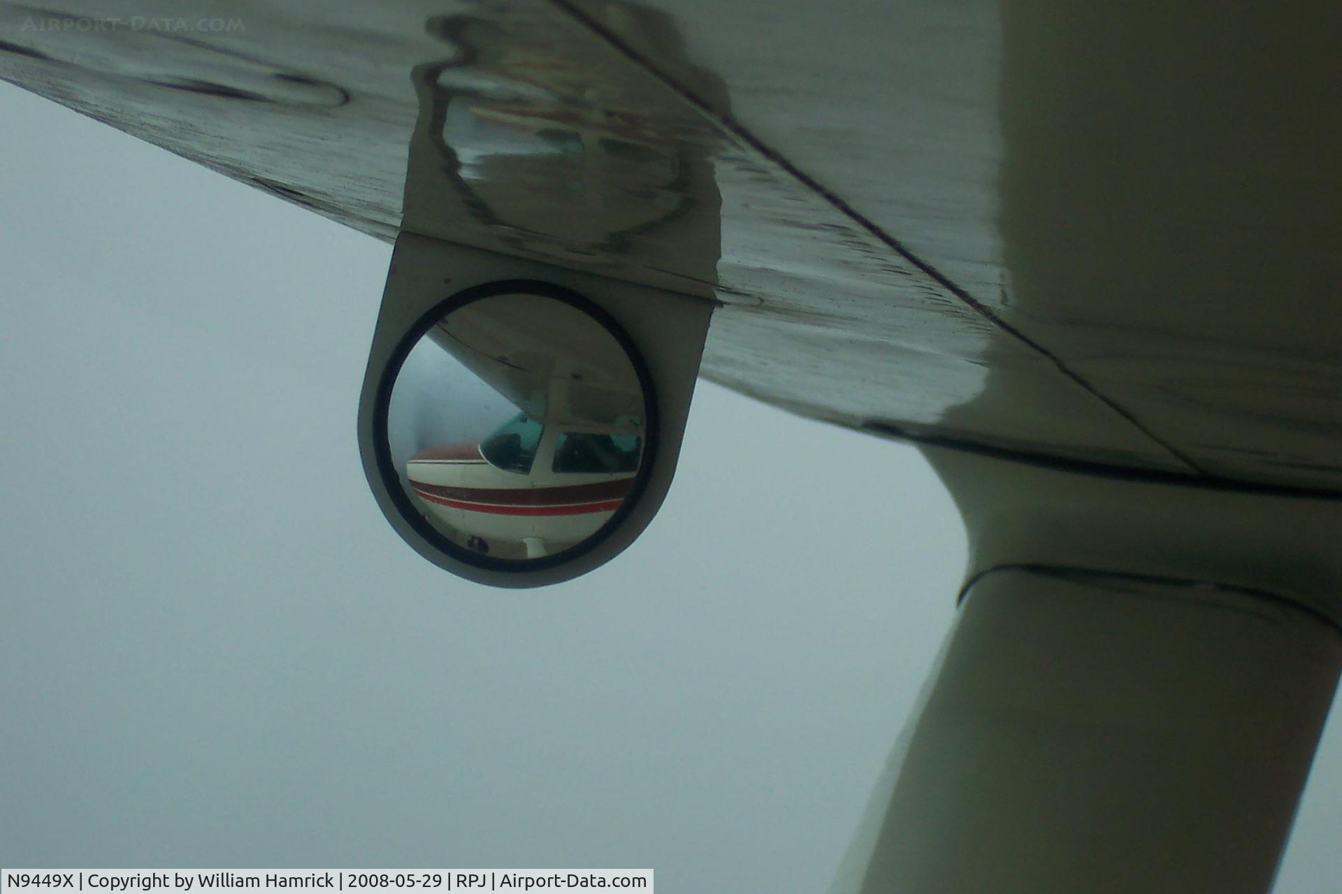 N9449X, 1961 Cessna 210A C/N 21057749, Self Portrait in Gear Mirror
