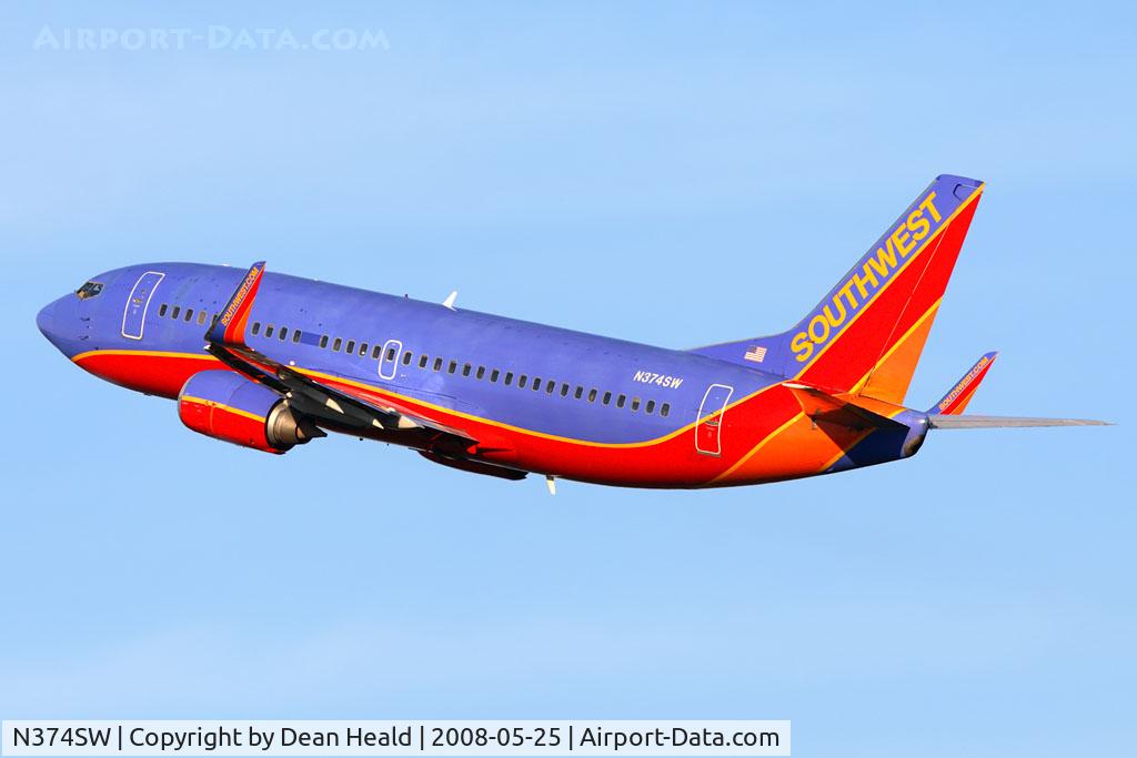 N374SW, 1993 Boeing 737-3H4 C/N 26582, Southwest Airlines N374SW (FLT SWA1746), 733 now with winglets, climbing out from RWY 5 enroute to Nashville Int'l (KBNA).