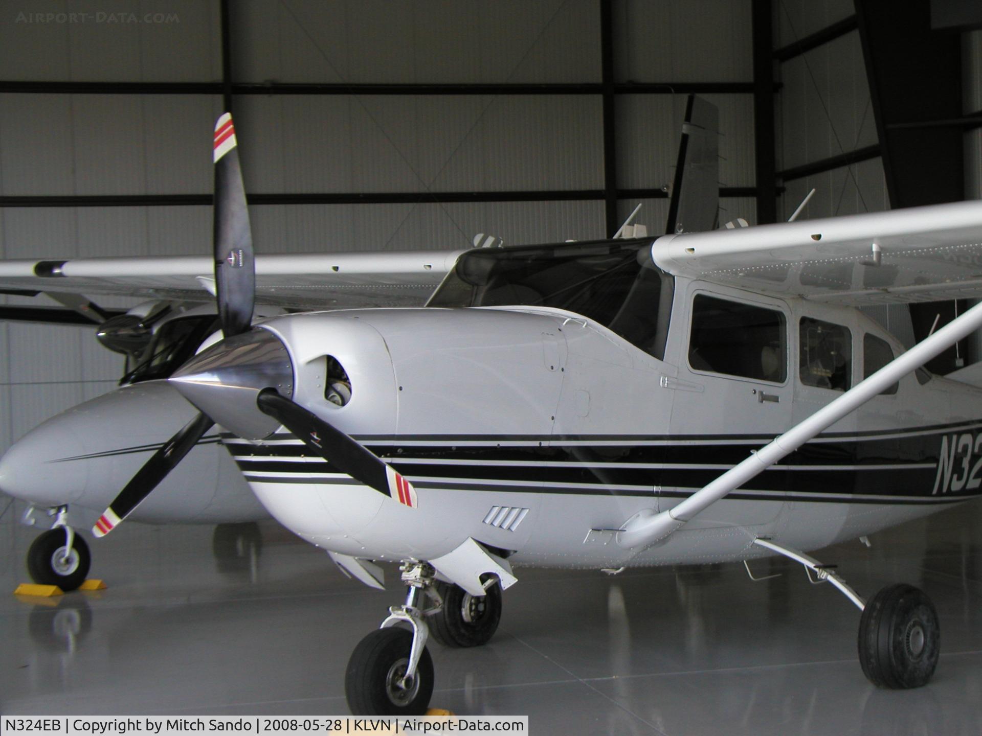 N324EB, 2003 Cessna 206H Stationair C/N 20608190, Parked inside the Aircraft Resource Center hangar.
