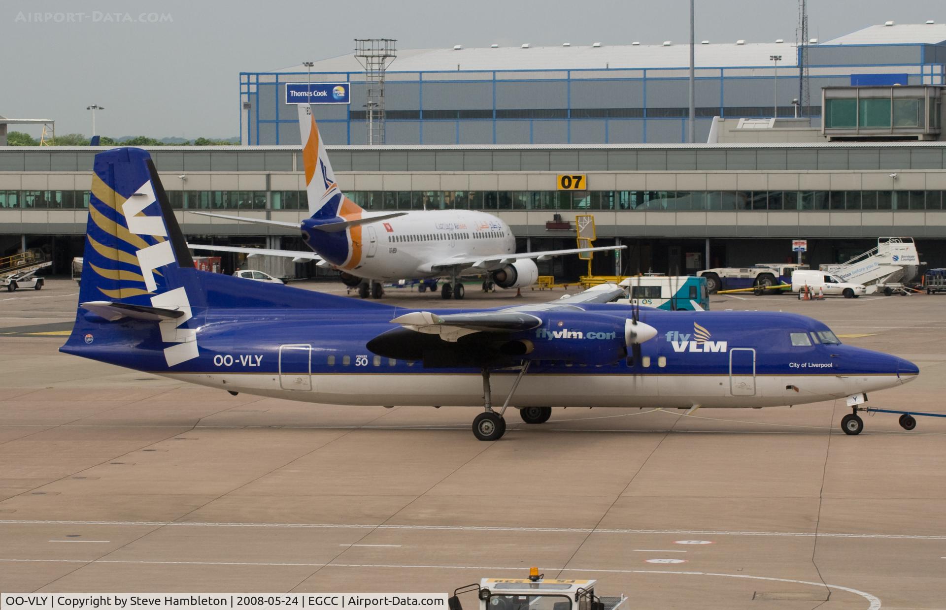 OO-VLY, 1990 Fokker 50 C/N 20181, Taken from inside Termninal 3 at Mnachester