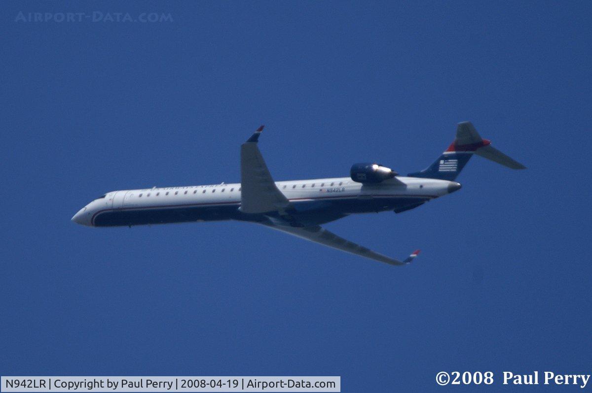 N942LR, 2005 Bombardier CRJ-900ER (CL-600-2D24) C/N 15042, One of the few right turns from Wilmington from RWY 24