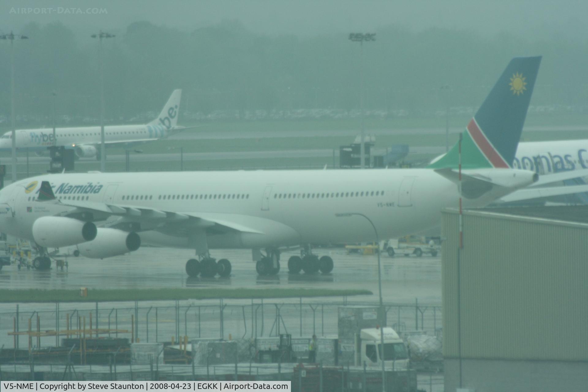 V5-NME, 1994 Airbus A340-311 C/N 051, Taken on a gloomy wet morning at Gatwick Airport