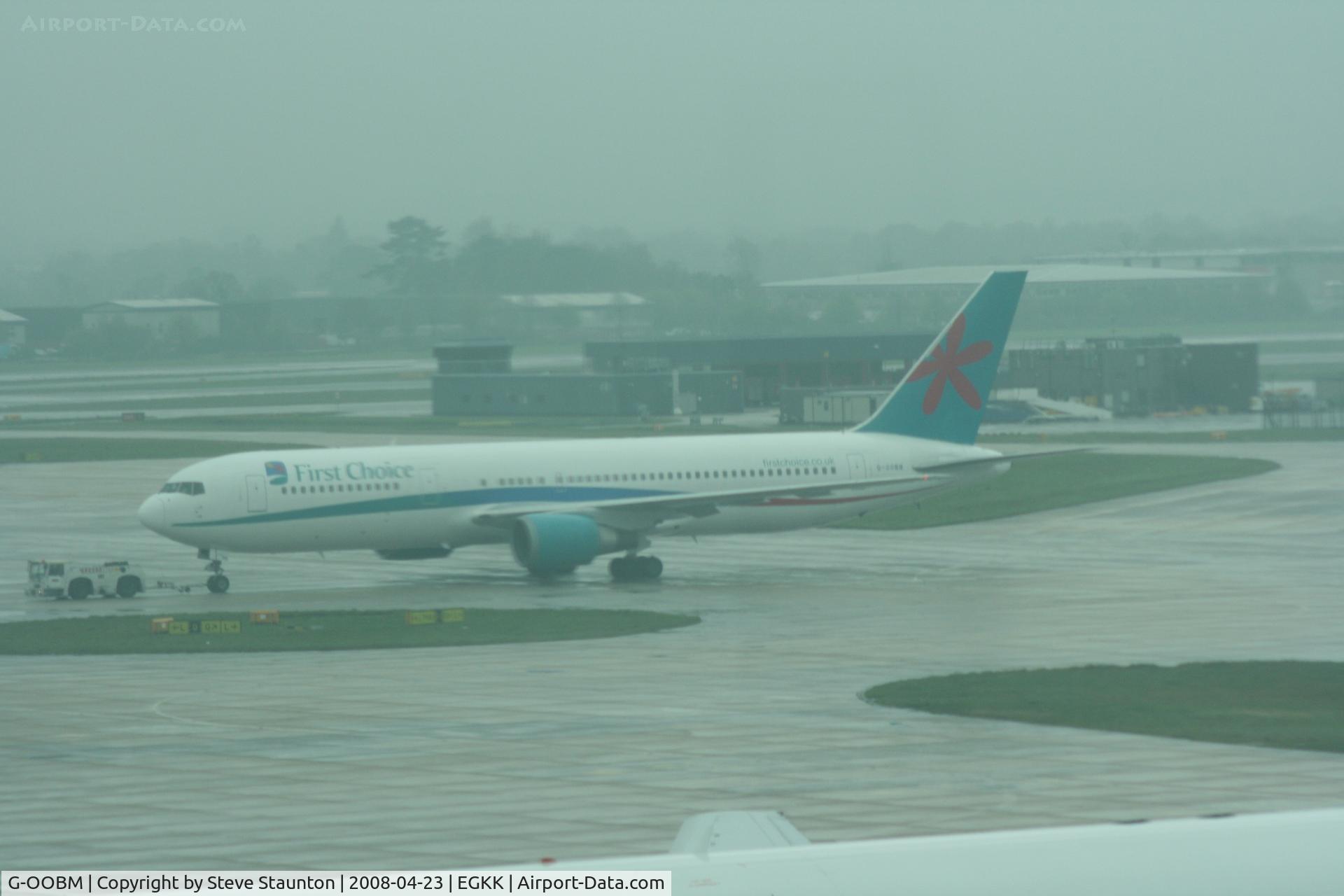 G-OOBM, 1995 Boeing 767-324 C/N 27568, Taken on a gloomy wet morning at Gatwick Airport